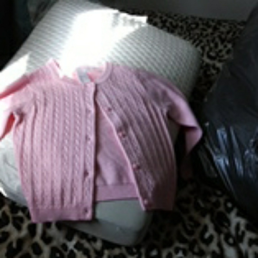 Pink cardigan sweater